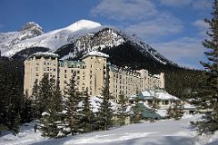 01A Chateau Lake Louise Front Side With Mount Niblock and Mount St Piran In Winter